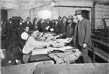 Men at the recruiting office at the Town Hall,...